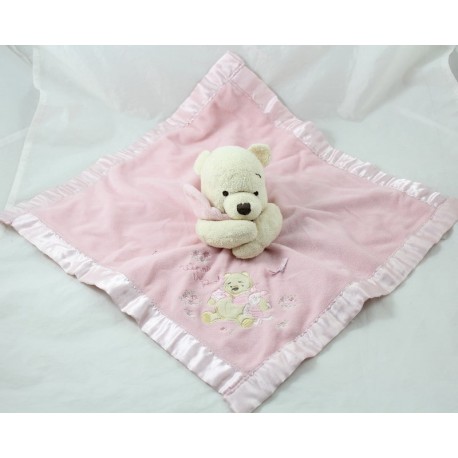 Doudou plana Winnie the Pooh DISNEY STORE nodo satén rosa de Winnie the Pooh 