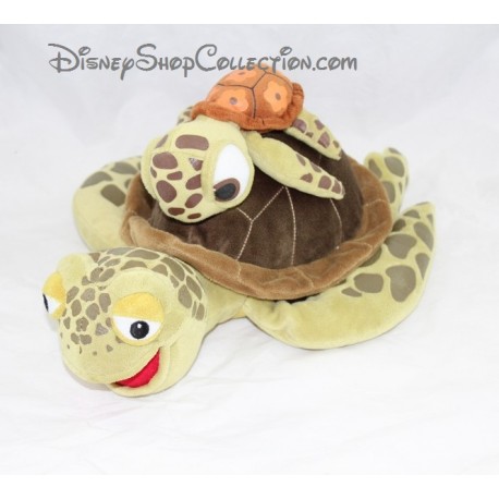 Peluche Crush tortue DISNEYLAND PARIS Le Monde de Nemo avec Squiz sur le dos