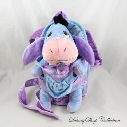 DISNEYLAND RESORT PARIS Peluche de burro Eeyorey en su portabebés y chupete magnético Disney 29 cm