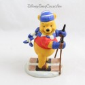 Figurine en porcelaine DISNEY Winnie fait du ski