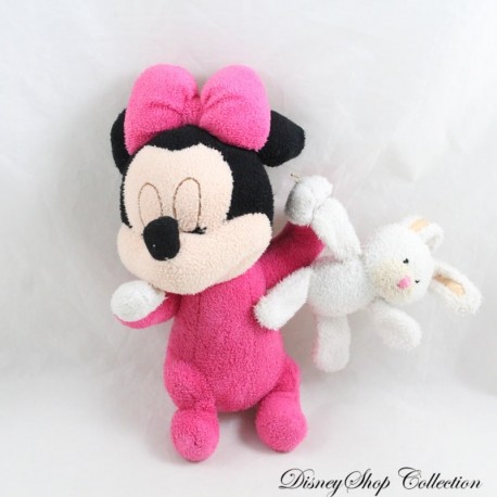 Peluche Minnie DISNEY couché sur le ventre avec son doudou lapin blanc 18 cm